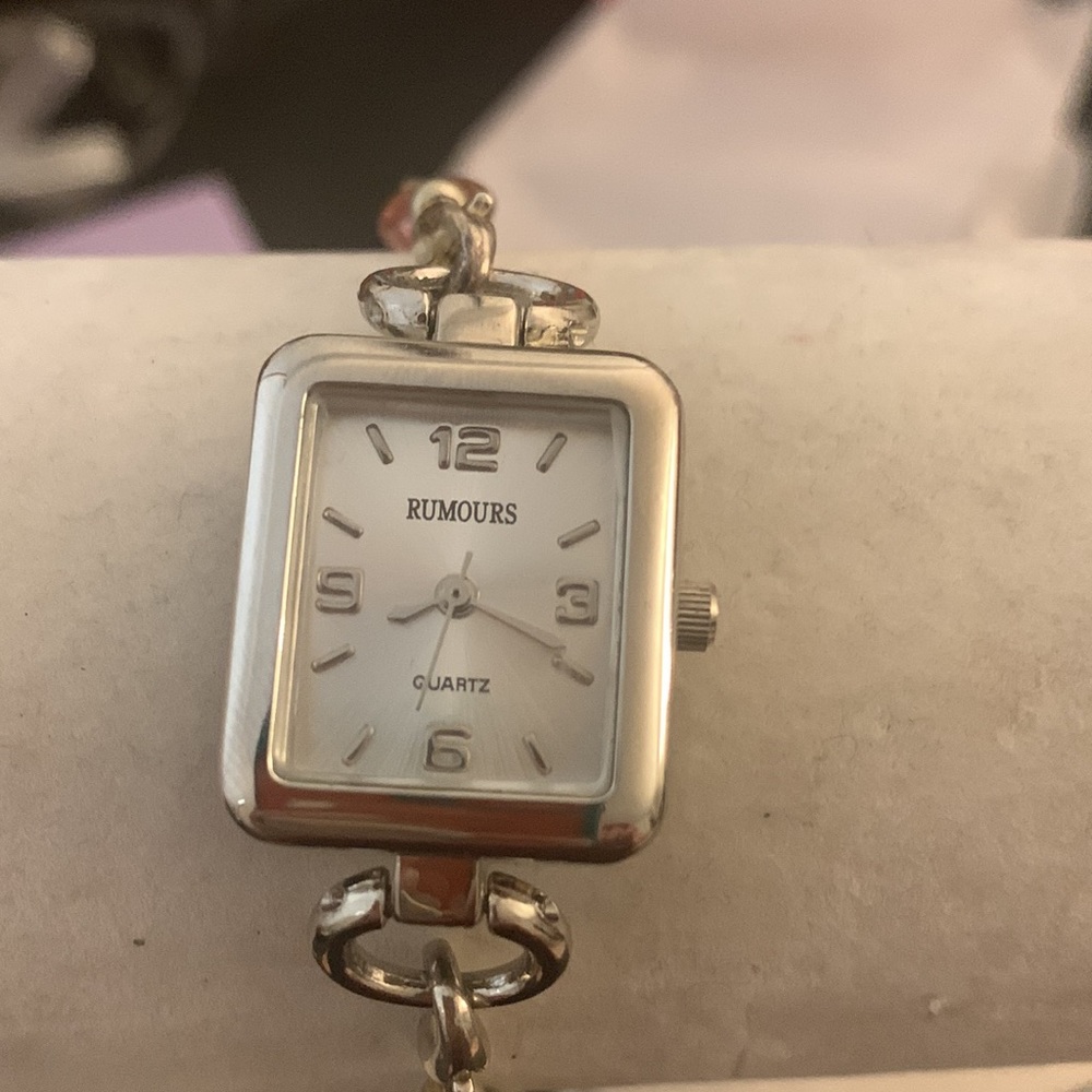 Pretty bracelet watch. Pink, green, silver beads Has stretch.see all photos.